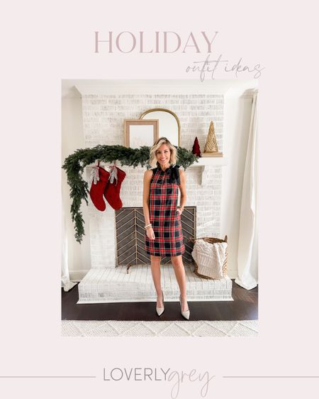 The bow detail on this shift dress is so cute! The perfect holiday dress! Loverly Grey is wearing a 00 

#LTKunder50 #LTKHoliday #LTKsalealert