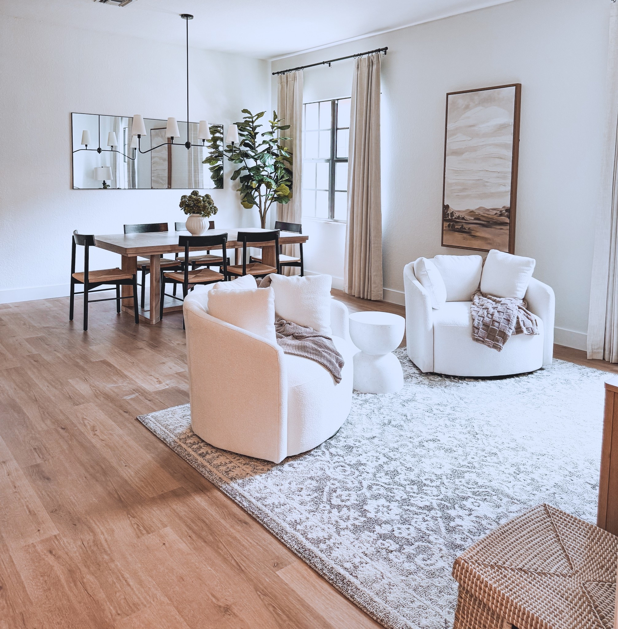 The most stunning home decor. Swivel arm chairs, area rug, dining chairs and so much more! Shop this gorgeous room below! 

#LTKSaleAlert #LTKHome #LTKStyleTip