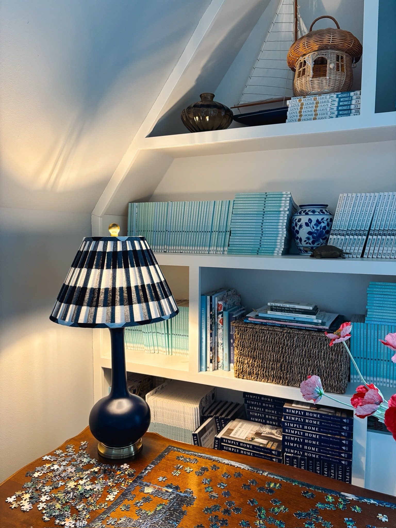 Blue and white gingham shade lamp, woven lidded basket, mushroom basket, books, and more sources from this room 

#LTKHoliday #LTKHome #LTKStyleTip