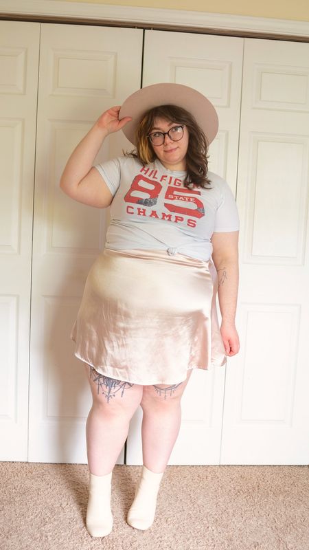 Plus size graphic tee and skater skirt outfit

#LTKSeasonal #LTKstyletip #LTKcurves