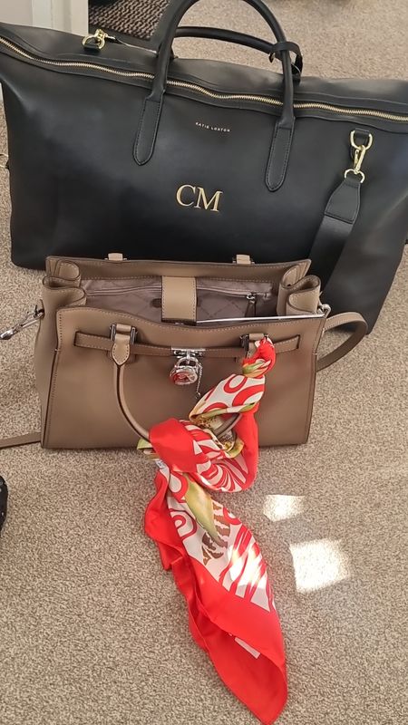 For the perfect getaway. The Katie Loxton Oxford Weekend bag is so spacious and can me personalised with your initials which is so cool. It come in fuax leather GET 15% OFF SITE WIDE USING KLDTZ2MC. By its side a statement Michael Kors Hamilton handbag accessorised with a ferragamo scarf. What more do you need for a getaway.

#LTKtravel #LTKeurope #LTKitbag