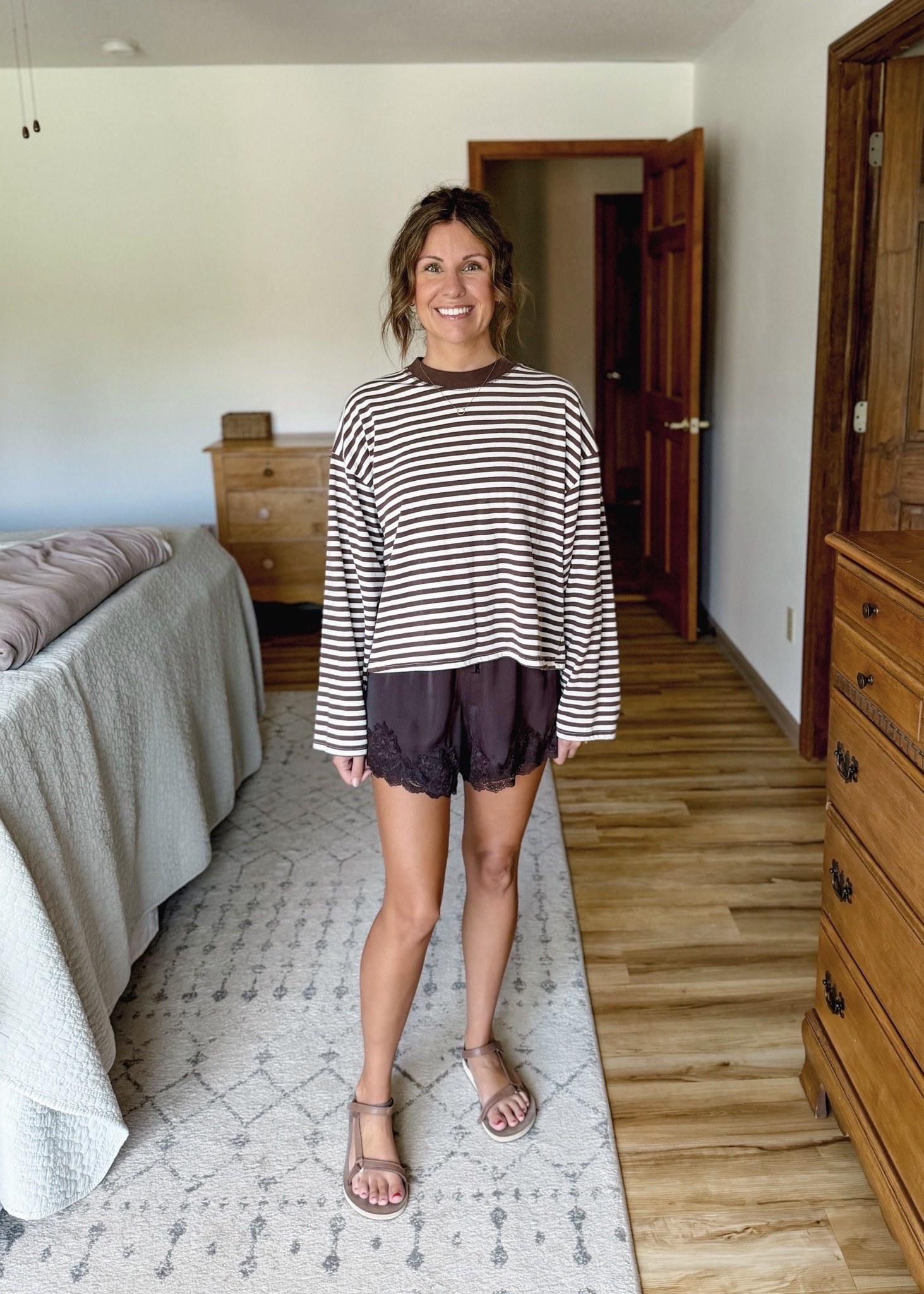 Satin and lace shorts Fall outfit 2🤎

 Xs in the striped shirt and xs in the lace trim satin shorts (selling out—also linked similar). My teva sandals are size 6