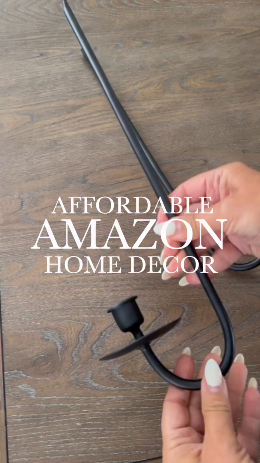 these super affordable, minimal black iron sconces that instantly elevate your space. Comes as a set of two and works beautifully with real or flameless taper candles.

#LTKHome