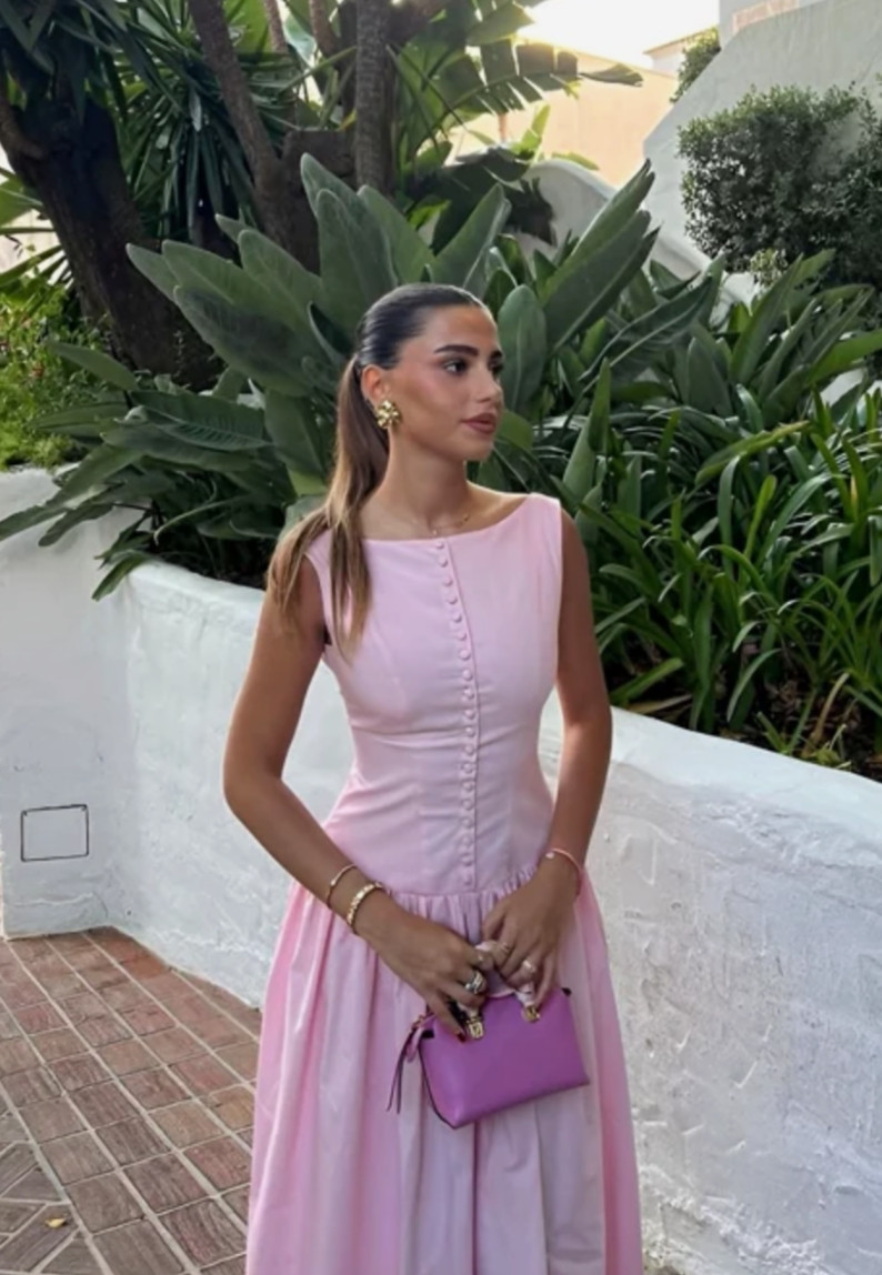 Chic pink dress outfit featuring a fitted midi dress and structured handbag—perfect for feminine, elevated summer style and timeless outfit ideas.
Style tip: opt for soft, classic colors like blush pink for a refined look, focus on tailored fits to enhance your shape, and keep accessories minimal and elegant for an effortlessly sophisticated finish. 

 #LTKootd