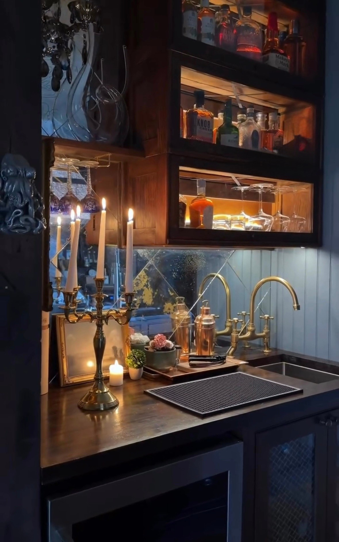 A moody, well-styled bar moment where warm lighting, vintage brass, and thoughtful details turn a simple pour into an experience. Designed for slow evenings, good bottles, and even better company.

 #bar #CallSignDesign #Vintage #Luxury #InteriorDesign #InteriorDecorating #Elegance #Chandelier #OldWorldCharm #DesignStyle #CastleCore #OldWorldCharm  #SimpleSwaps