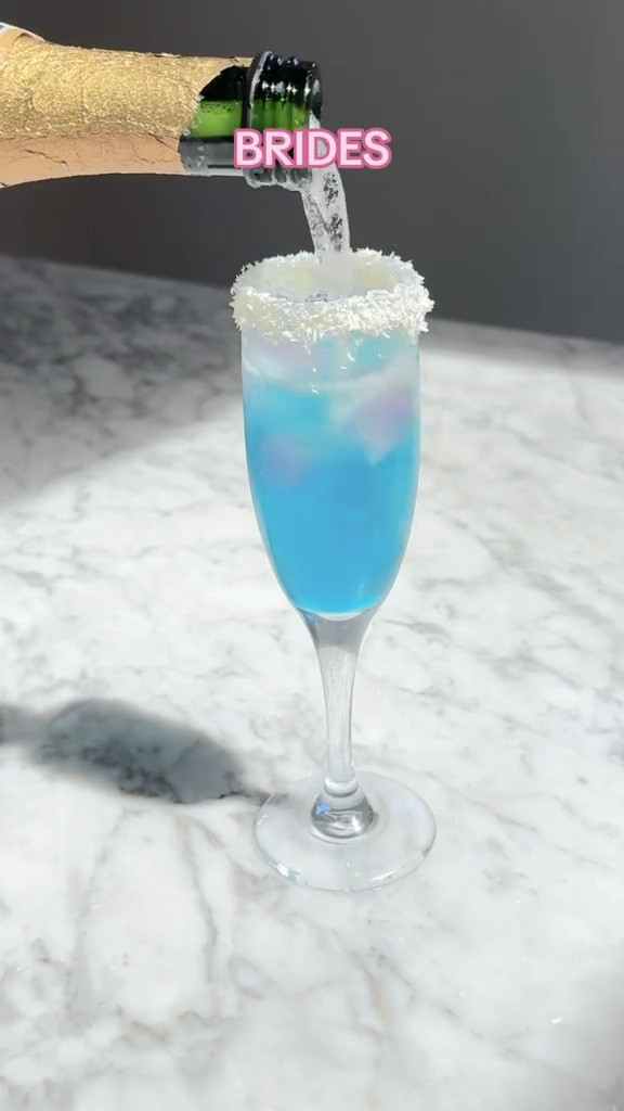 Brides, your new favorite drink is this Something Blue Mimosa!! The round ice cubes are a must!! #bride #mimosa #bacheloretteparty

#LTKHome #LTKWedding #LTKParties