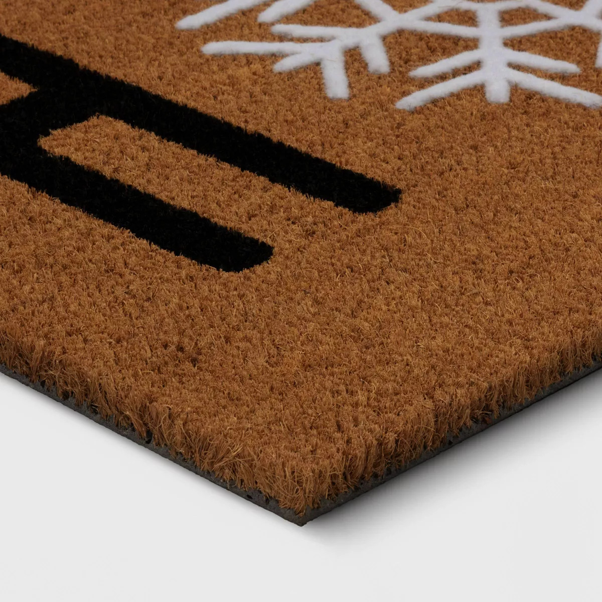 1'6"x2'6" Christmas Snowflakes 'Home' Flocked Coir Doormat Black/White - Wondershop™ | Target
