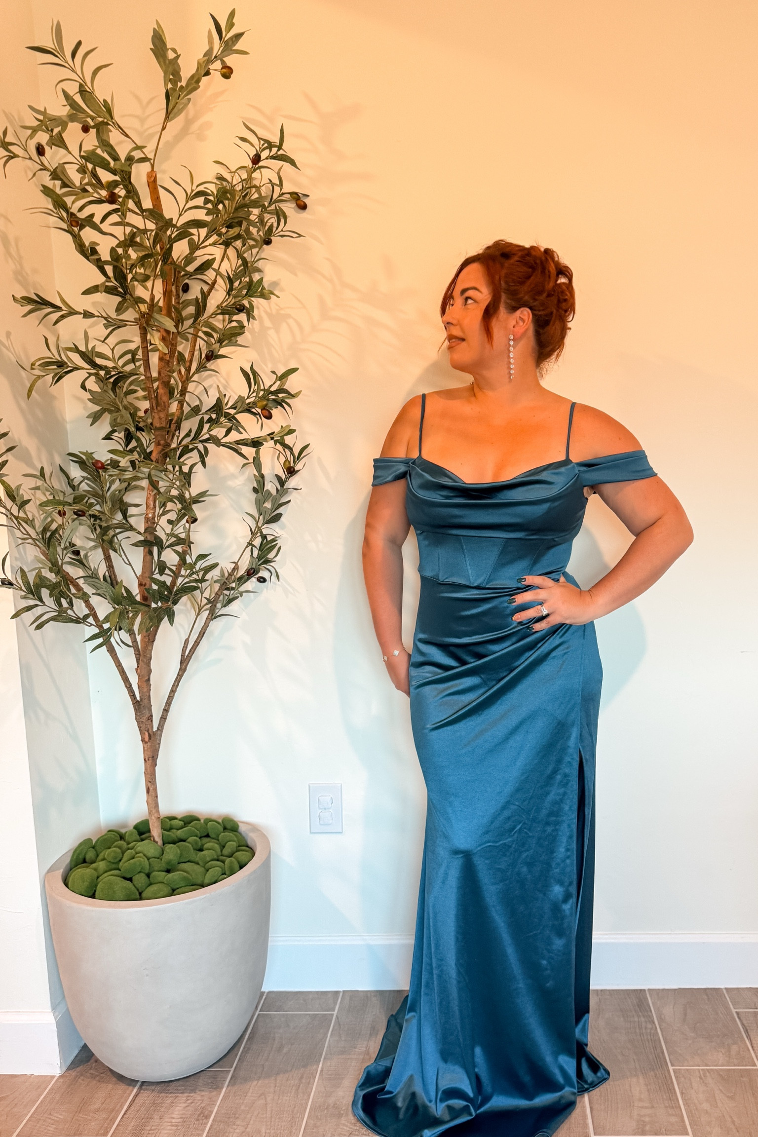 Best faux fur live tree setup . Also one of my favorite formal
Dresses of all
Time ! 