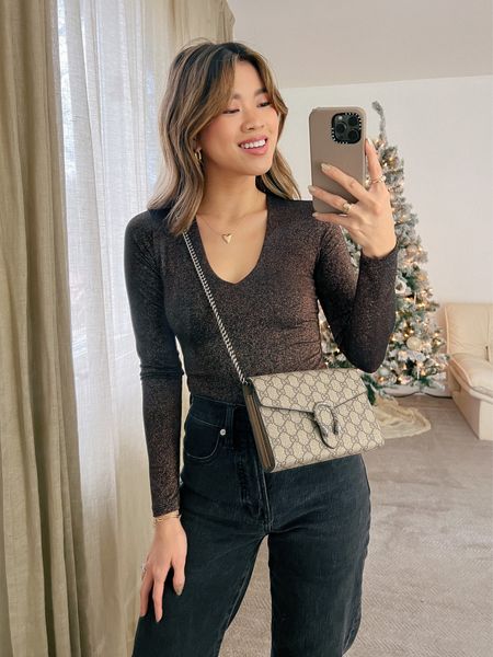 Abercrombie chocolate brown long sleeved bodysuit with Madewell black denim jeans and tan western booties and a Gucci bag!

Top: XXS/XS
Bottoms: 00/0
Shoes: 6

#winter
#winterfashion
#winterstyle
#winteroutfits
#holidayparty
#holidayoutfit
#holiday
#boots
#abercrombie
#madewell
#gucci
#jeans

#LTKstyletip #LTKHoliday #LTKSeasonal