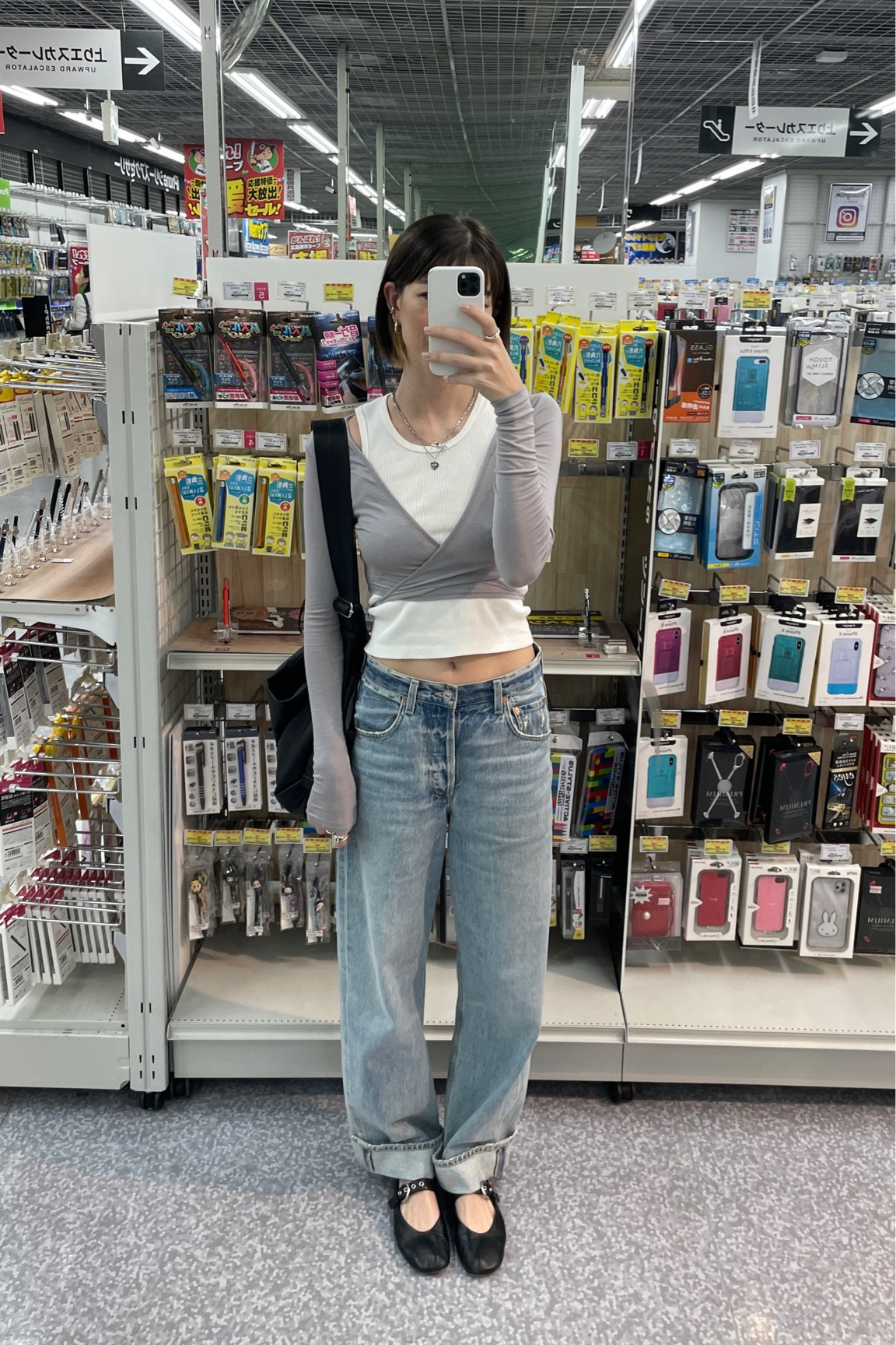 wrap top: Geel, tank: brandy Melville, jeans: citizens of humanity, shoes: reformation 
