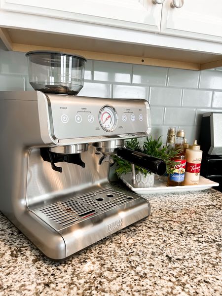 Espresso machine with grinder, with milk frother, steamwand, barista latte machine with removable water tank for cappuccinos or macchiatos. 
We absolutely love our new machine  