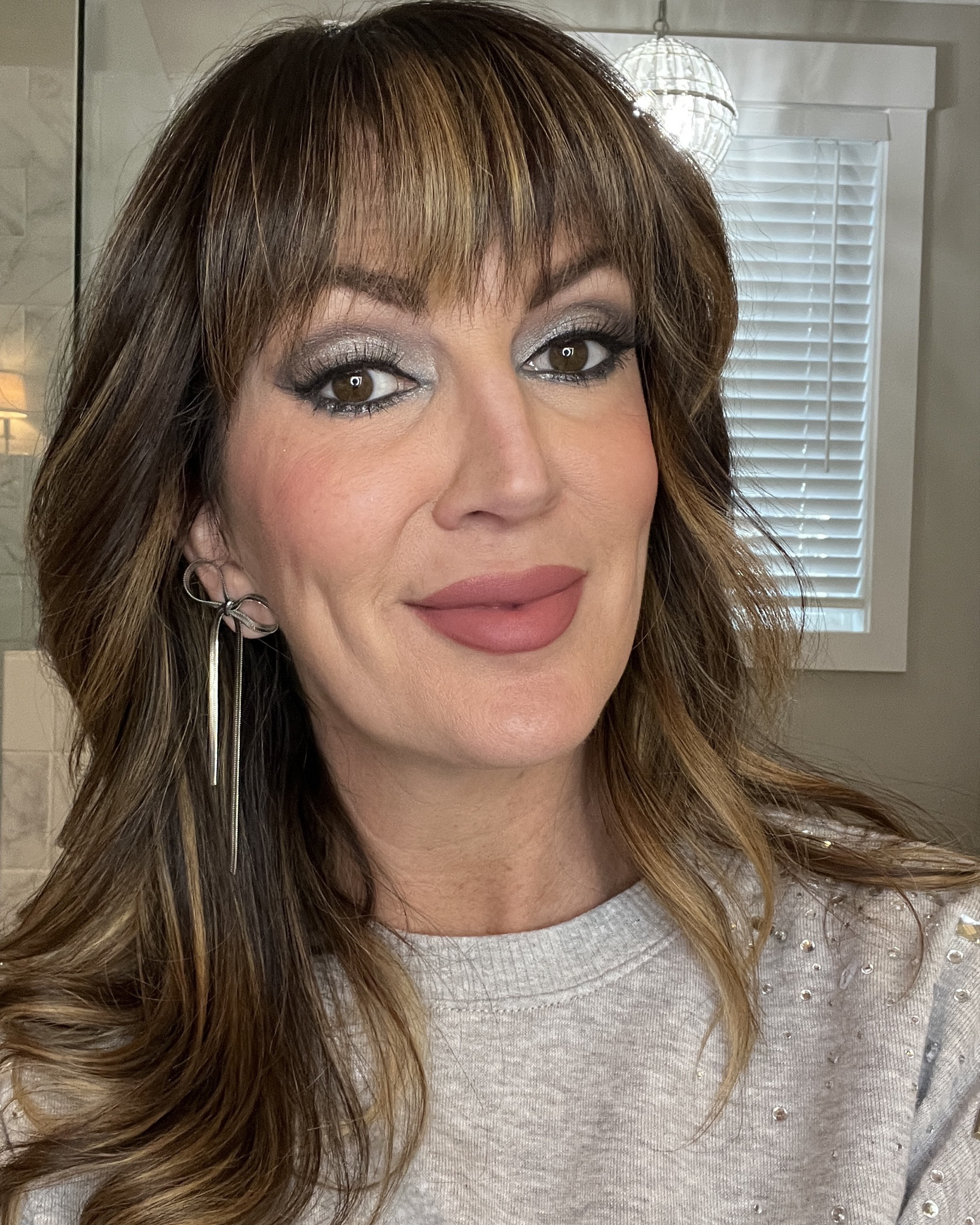 Silver🩶 Bells Eyes! Loved taking my everyday eye makeup to THIS! Great combo of silver shadows and my VB silver liner in “sea gray”. Lip shade is : “first kiss"

#LTKHoliday #LTKBeauty #LTKgrwm