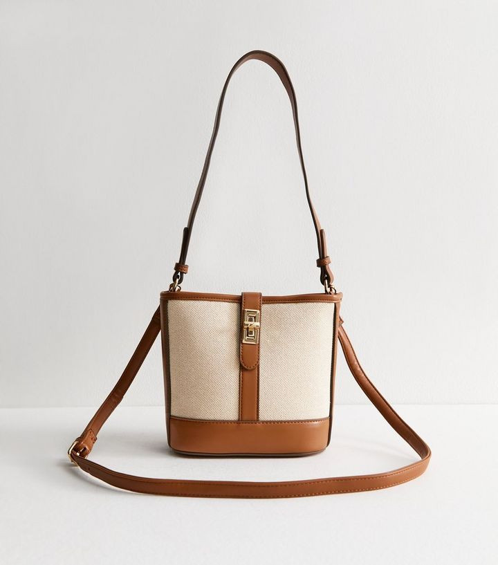 Brown Faux Leather Twist Lock Canvas Bucket Bag
						
						Add to Saved Items
						Remove from... | New Look (UK)