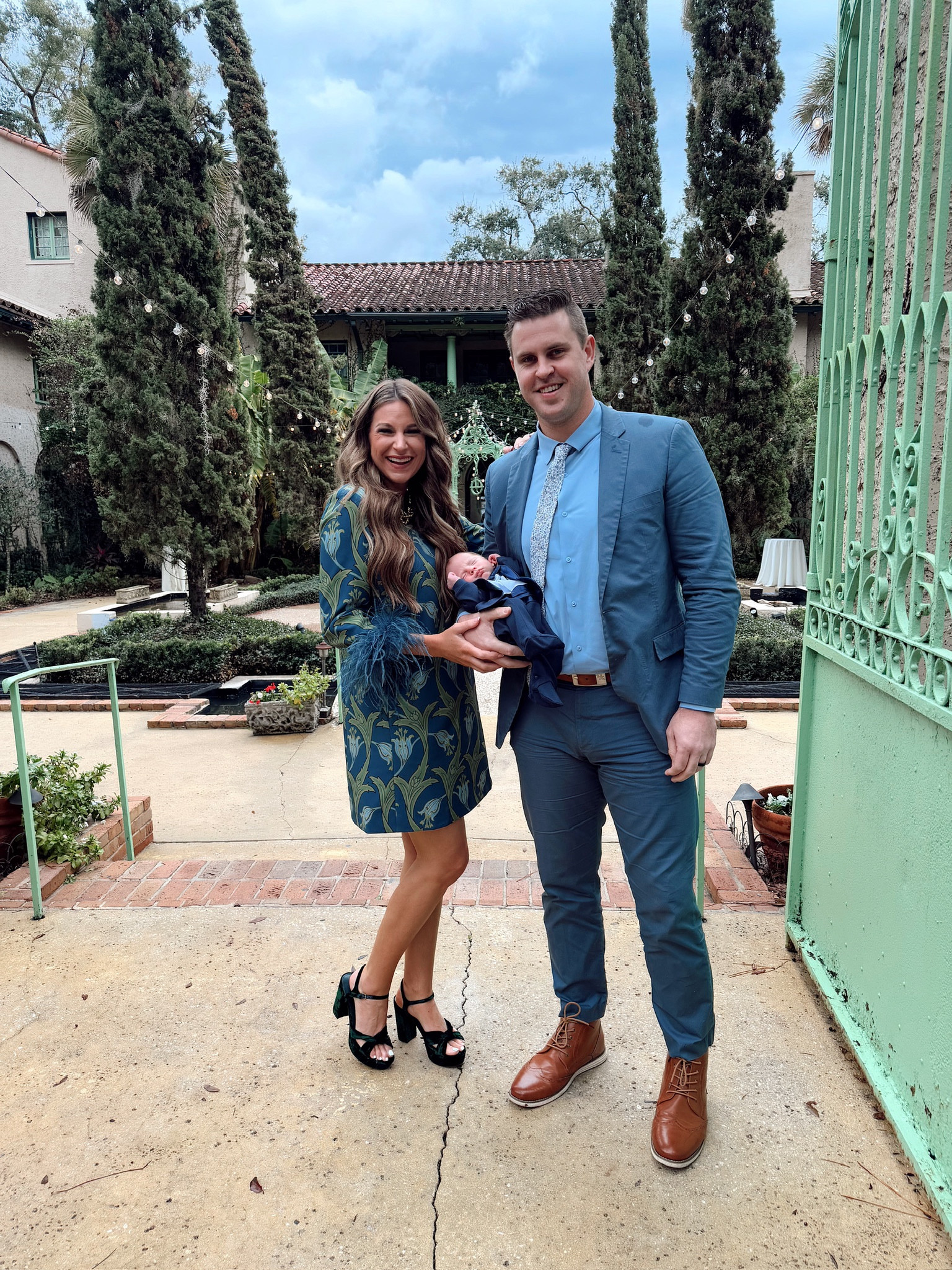 In a medium Tuckernuck feather trim dress and velvet platform heels - fits tts. 
Sean in an xl suit and shirt with dress shoes - fits tts. 
Baby boy in a tuxedo onesie! 

#LTKFamily #LTKBaby #LTKSummerEdit