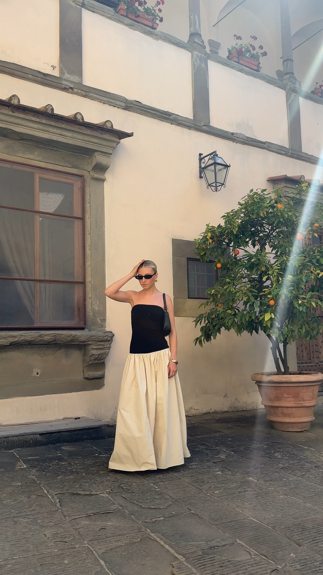 Black and cream drop waist summer sun dress for Italian wedding 

#LTKSeasonal #LTKSaleAlert #LTKVideo