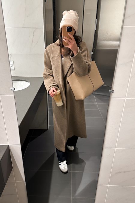 Monday workwear 🤎 not super into work right now but trying to stay positive with these things on my mind: 
-dying over Taylor’s announcement last night! 🖤
-Valentine’s Day plans💋
-this mango coat is so warm and love how long it is!
-love how light it is staying outside ☀️ 


Workwear, officewear, work outfit, work coat, mango coat, long wool coat, adidas samba, sambas outfit, sambas look, petite work look, petite work outfit, winter workwear, petite trousers, petite officewear, 9-5 outfit, business casual, smart casual, work outfit inspo, petite work pants, petite pants