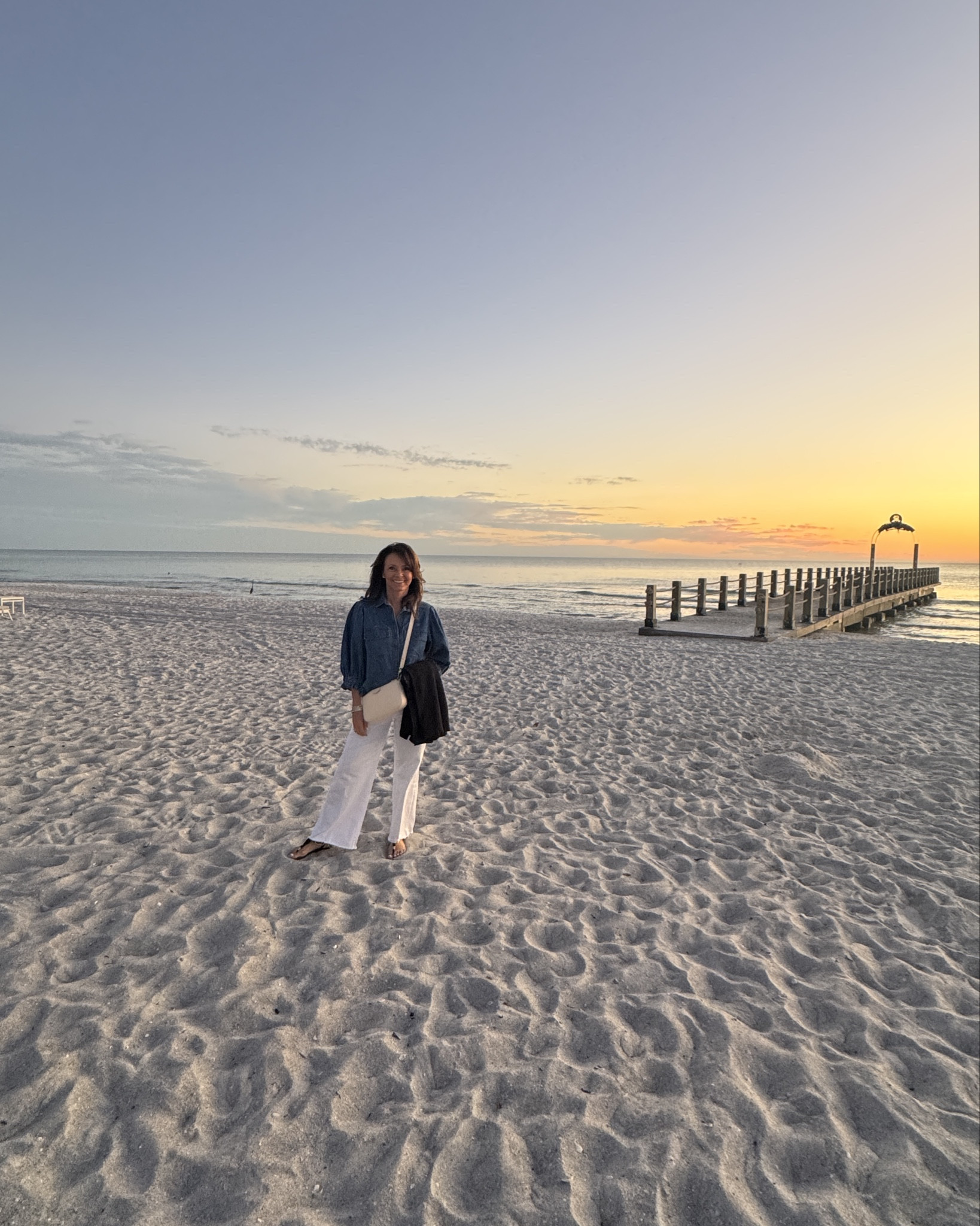 Vacation sunsets. 
Outfit of the night:
Denim puff sleeve button down top
White wide leg denim
Travel shawl

#LTKTravel #LTKGiftGuide #LTKPetite