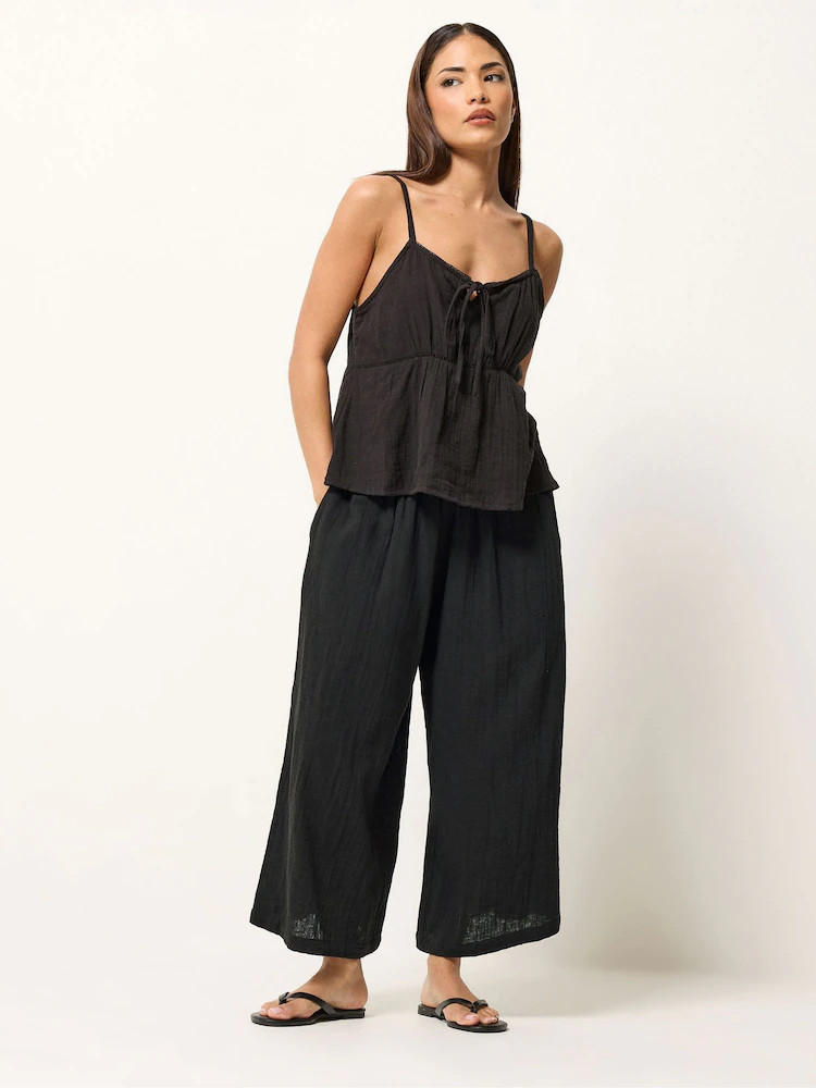 PixieGirl Petite Black Cheesecloth Wide Leg Cropped Culottes | Next US