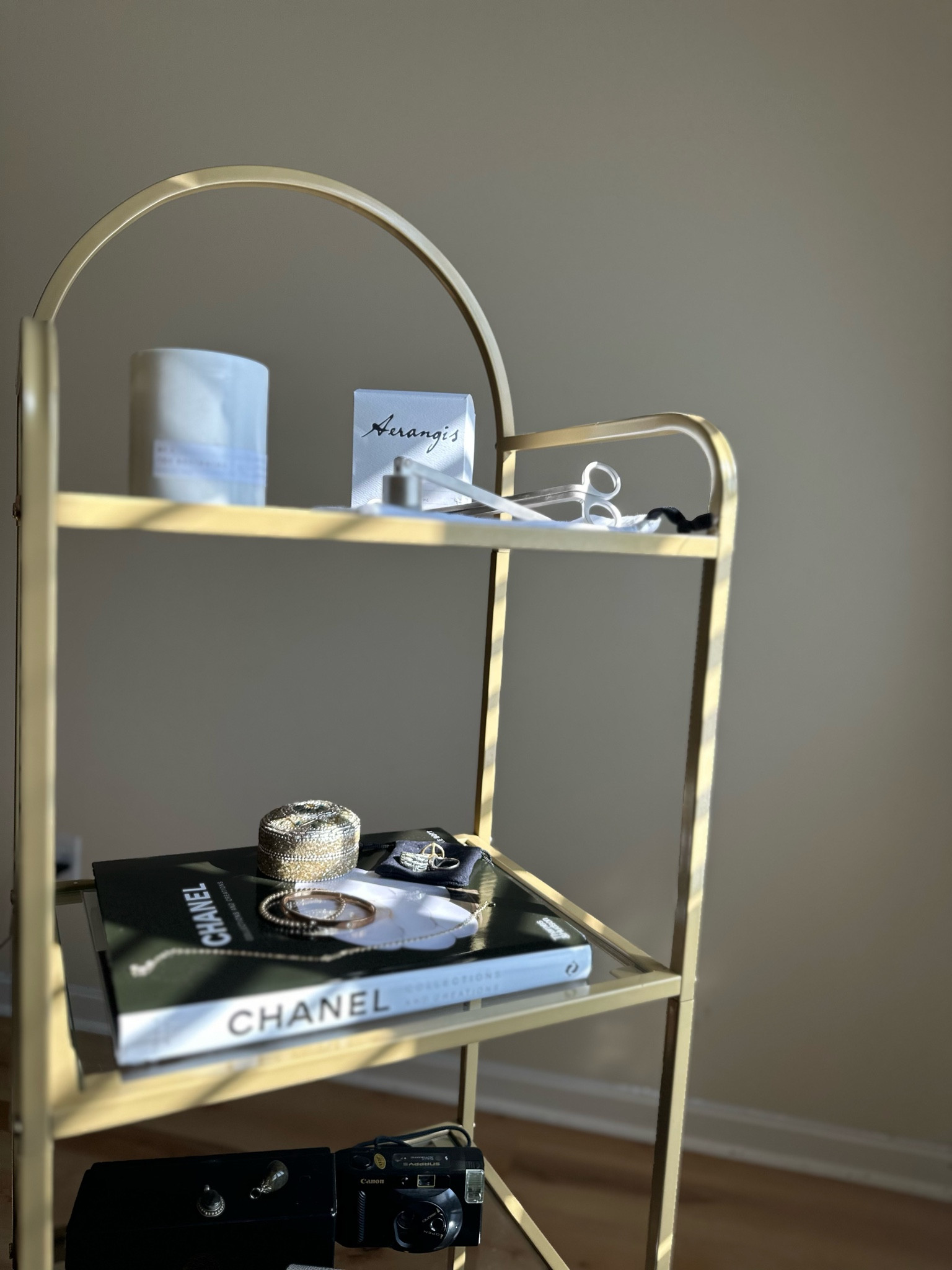 Gold tempered glass accent shelves / bookshelves / glass shelves / display / jewelry display / coffee table / Chanel / coffee table books / Amazon home / designer home / affordable home decor / luxury candles 

#LTKFindsUnder100 #LTKHome #LTKWedding