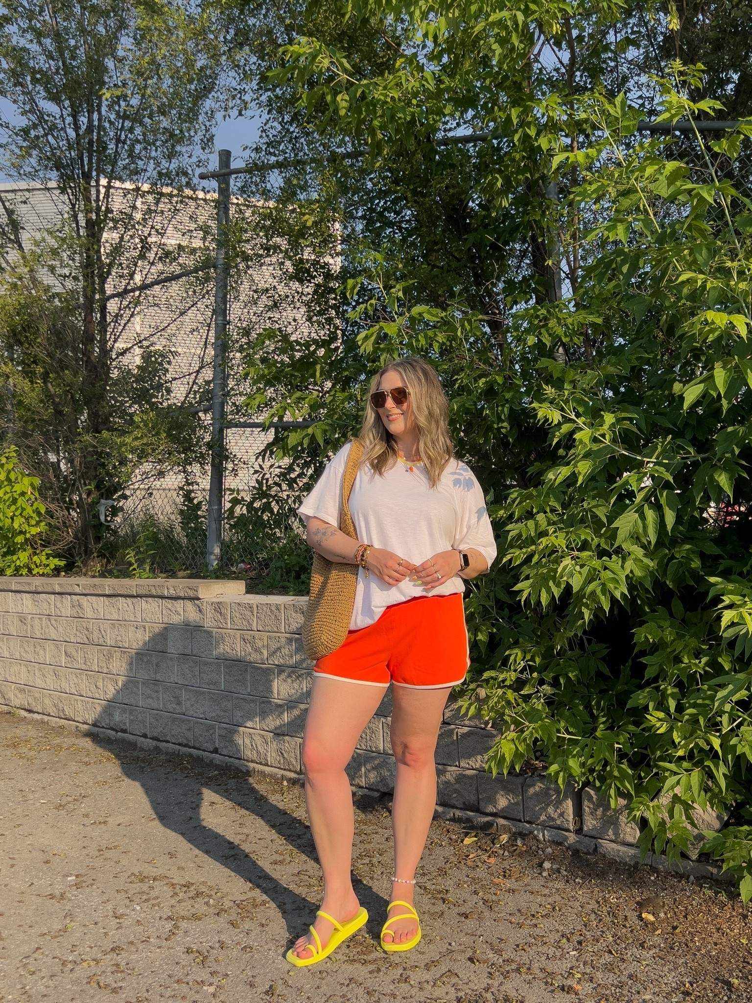 Comfy casual summer outfit! Wearing my usual size L in both the white tee and red orange dolphin shorts. Crocs sandals are super comfy, I’m a 9.5-10 and wear a 10

#LTKsummer #LTKsale #LTKmidsize