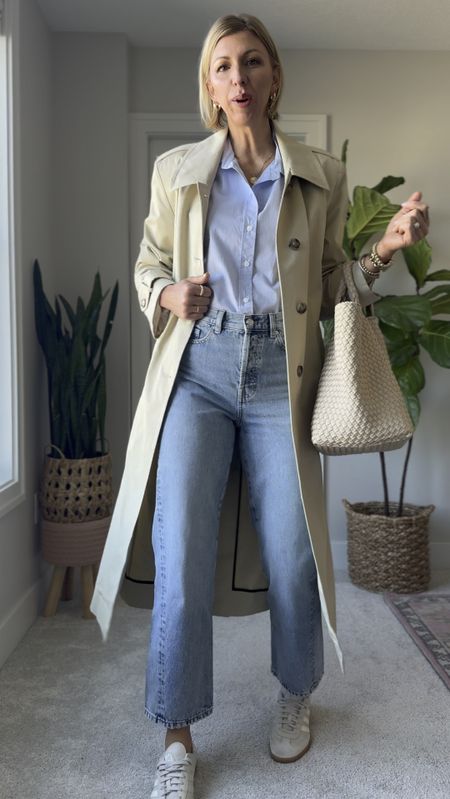 Effortlessly chic outfit for spring with a blue button up shirt, straight, leg, jeans, sneakers, trenchcoat, woven tote

I am wearing my true size small in the oversized button up shirt, size 6 in the jeans. I’m 5 foot 10 for height reference.

#LTKfindsunder50 #LTKVideo #LTKover40