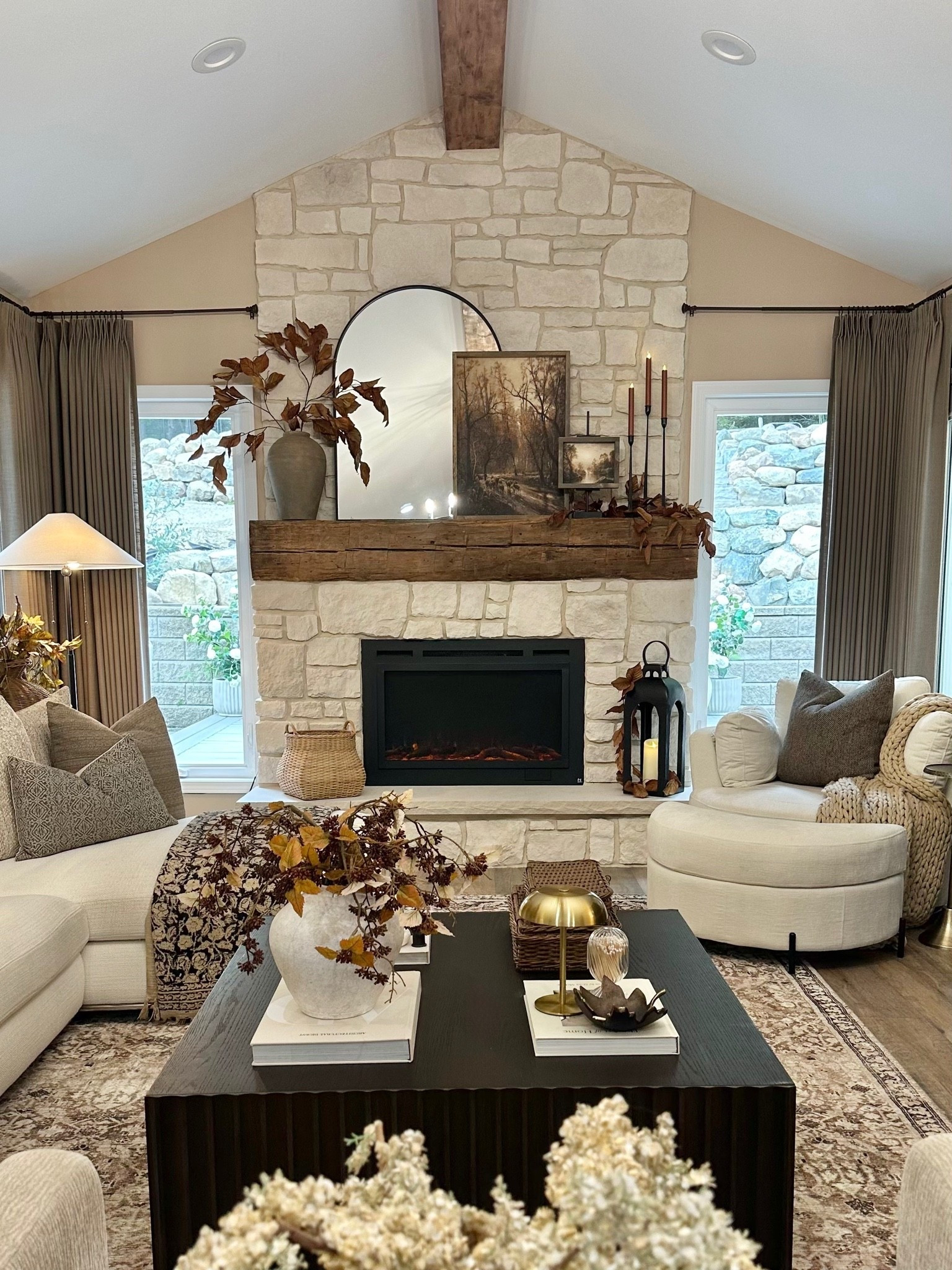 A Cozy Fall Living Room Designed To Feel Like Home. 🍂

There’s something about adding those first layers of fall that instantly makes a room feel warmer and more inviting. Soft textures, warm wood tones, vintage-inspired details, magnolia stems, and a few simple seasonal touches gave this space the cozy fall feeling I was looking for.

The Anya CloudPile™ Printed Rug from the Joon Loloi Fall Collection is the foundation that quietly pulls the entire room together. Its subtle vintage-inspired pattern adds warmth and character without overwhelming the space, and the CloudPile™ construction is exceptionally soft underfoot while still being durable enough for everyday living. I chose the 8’6” × 11’6” size to really anchor the room.

A few details that finished the space:
• Artwork: 20x28 and 7x9, both in Briarsmoke stain — use code FARMTOTABLE for 15% off
• Two magnolia stems styled in the vase on the mantel
• Three stems styled in the vase on the coffee table

It’s warm, layered, comfortable, and just enough fall. Exactly how I want our living room to feel this time of year. 🤎

#LoloiRugs #FallDecor #CozyHome #LivingRoomDecor #NeutralHomeDecor #ModernOrganic #FallHome #LivingRoomInspiration #CozyLiving

Home Decor | Cozy Fall Living Room | Fall Living Room | Area Rug | Joon Loloi | CloudPile Rug | Neutral Living Room | Vintage Inspired Rug | Modern Organic | Layered Neutrals | Fall Decor | Living Room Inspiration | Cozy Home | Home Styling

#LTKSaleAlert #LTKHome #LTKSeasonal