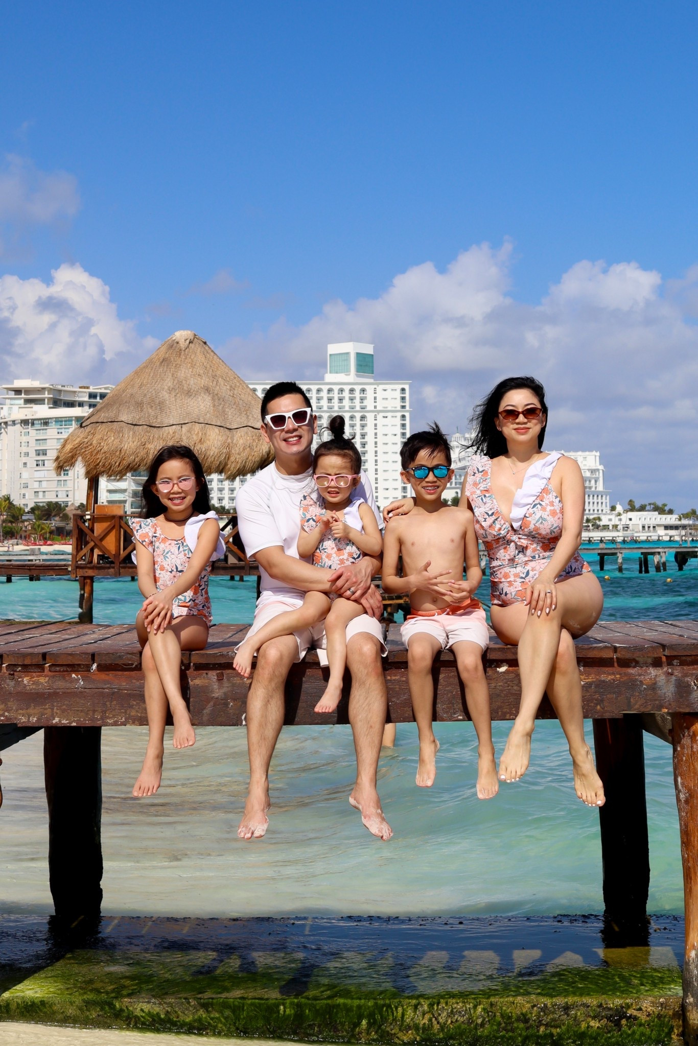 Family Matching Swimsuits // Super cute orange matching family swimsuits with ruffle trim neckline in a floral print and orange for the girls and white block shorts for the boys. Fits TTS.

#LTKSwim #LTKSeasonal #LTKmomlife