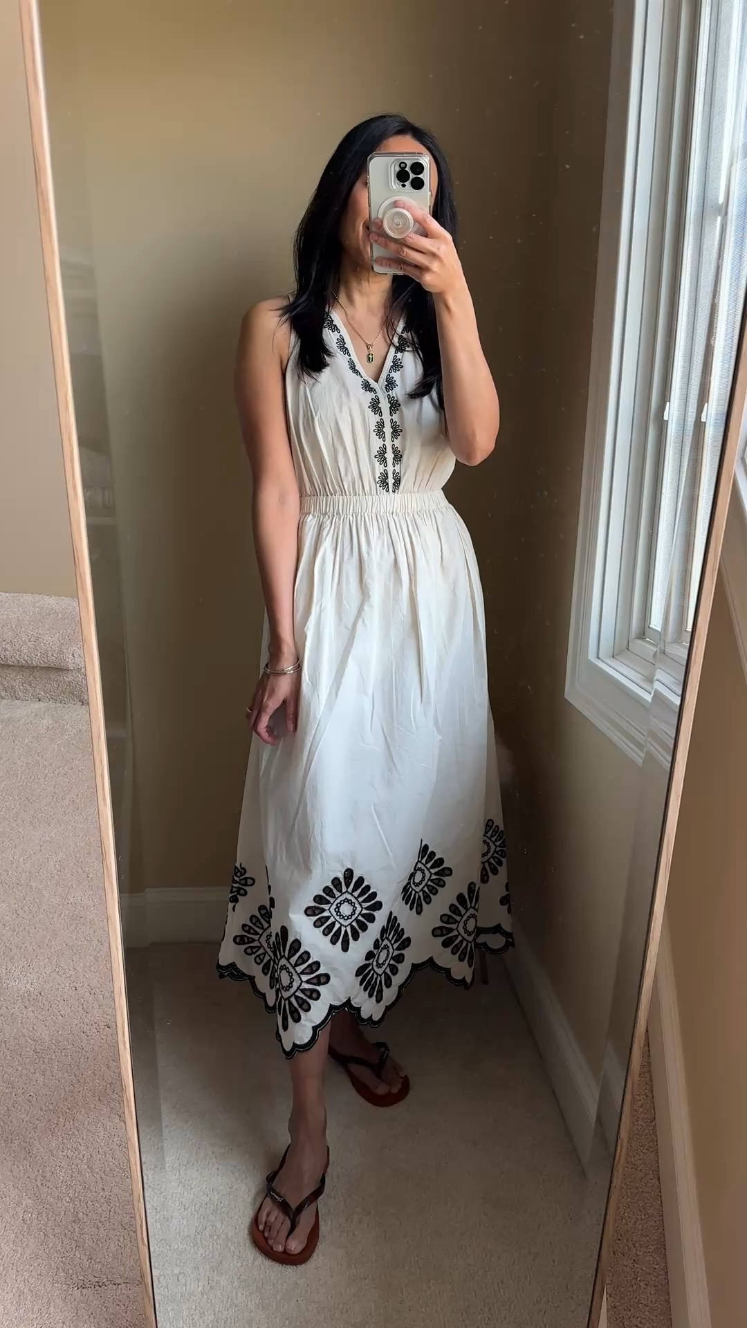 Spring dress. Spring break. Vacation. Easy cotton dress under $40. 
-This dress is made from 100% cotton, which is hard to find at that price point. Pretty embroidered details and a scalloped hem with a pretty eyelet pattern on the bottom. 
-It is unlined, but super lightweight. 
-Pockets and elastic waistband. 
-True to size; top was roomy for me. 
-The design feels like something from Madewell. 
-Elevated flip flops with tortoise straps and t-strap style with link detailing. Both true to size. 
-Birkenstock sandals true to size. 
-Layer with light cardigan or denim jacket. 


#LTKTravel #LTKOver40 #LTKFindsUnder50