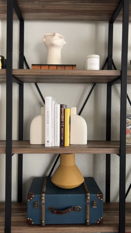 Restyled my shelves with these white ceramic book ends. Also loving the mustard textured vase, candles and coffee table book. All on sale for the next 3 days  

#LTKFind #LTKhome #LTKunder50