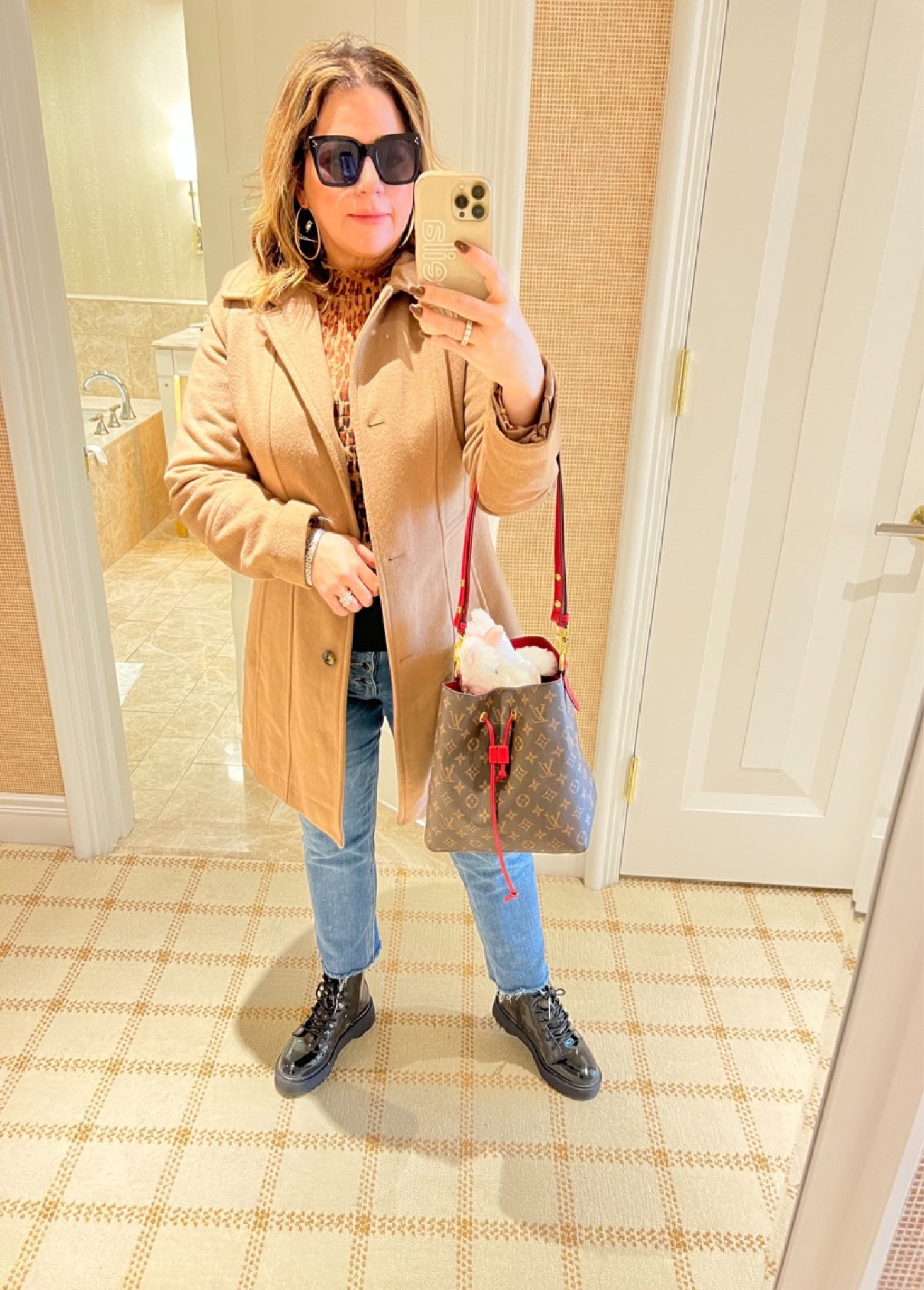 Embrace the wild side of style: cozied up in tan wool and roaring in leopard print. 🐆 #FashionForward
Coats, boots, winter outfits, neutrals 

#LTKover40 #LTKfindsunder100 #LTKSeasonal