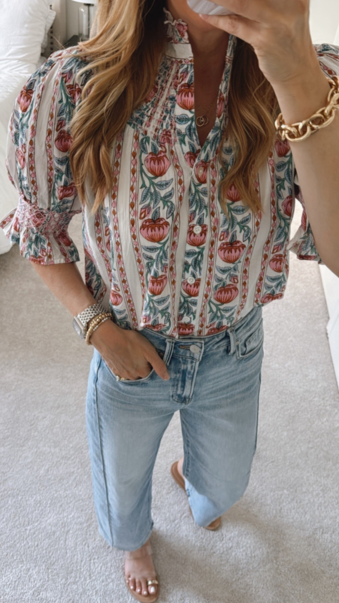 This floral top is so pretty. Love the colors and smocked detailing. Use code:COURTNEY20 for 20% off. 