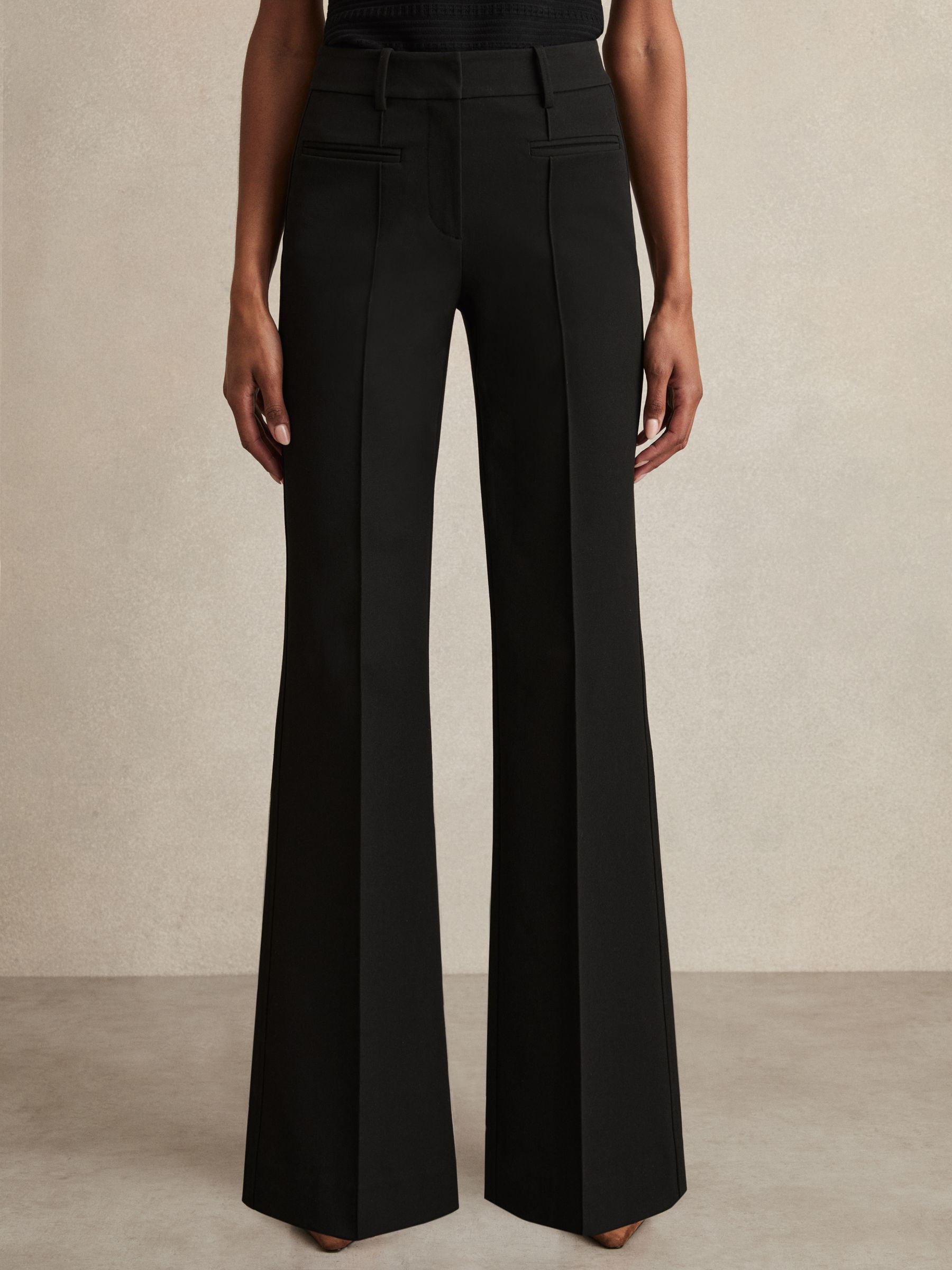 Petite High Rise Flared Trousers in Black | Reiss US
