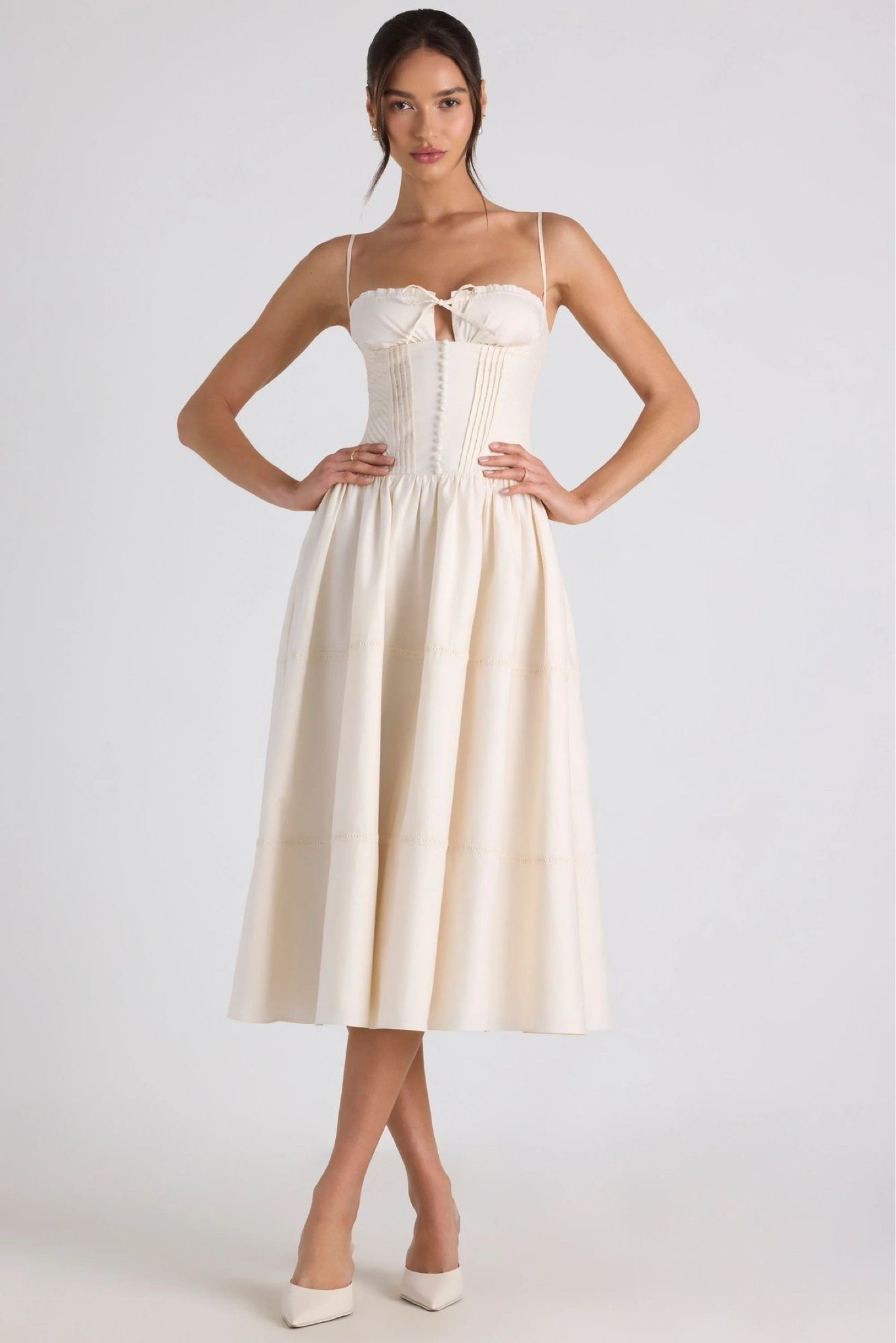 Step into timeless elegance with our exquisite cream midi dress. Featuring a flattering corset bodice and delicate spaghetti straps, this dress is perfect for any occasion. Elevate your wardrobe with this must-have piece that effortlessly combines classic style with modern sophistication. Shop now and embrace the beauty of effortless chic!

#LTKStyleTip #LTKBeauty #LTKSummerSales