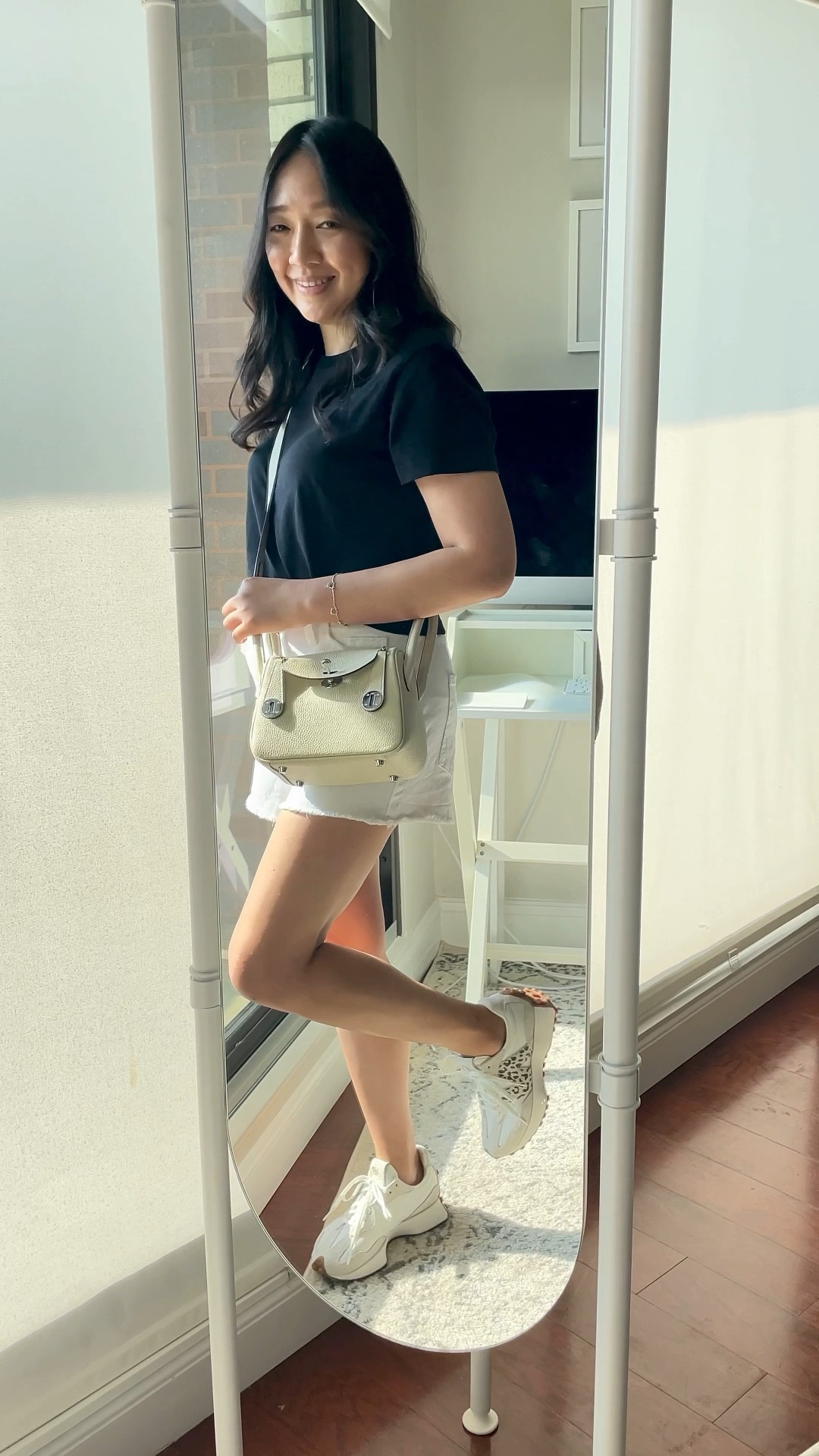 Uniqlo tee in size S. I have this tee in black and white (for the white color see my other recent post on LTK). It's the perfect cropped length if you're petite.

White shorts in size 2. I wonder if I need size 4 but am trying to get to a healthier weight. (Slowly losing  visceral fat by watching my portions.)

I personally go down half a size in the 327 New Balance sneakers but a lot of people say they run true to size. I find they're very wide and roomy in the toe box.

Exact crossbody bag linked.

I'm 5' 2.5" and currently 117 pounds.

Summer wardrobe basic staples

#LTKunder50 #LTKitbag #LTKshoecrush