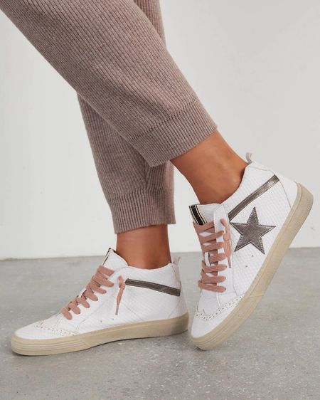 New white star high top sneakers. Use code ASHLEYBEARY for a discount! 

Metallic star
Pink shoelaces 

#LTKSeasonal #LTKshoecrush #LTKsalealert