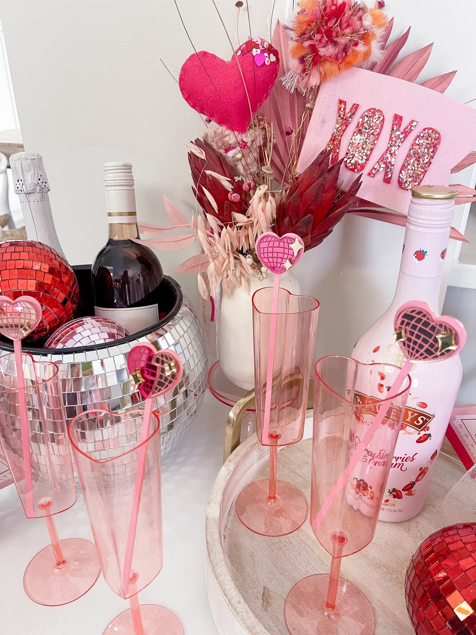 Valentine’s Day bar cart #barcart #valentinesday #galentinesday #Valentine’sDay #champagne #champagneflute #hearts #disco #discoball #icebucket #flutes #stirsticks #party #partydecor #partyware #tableware #glassware #cups #partylook #holidayparty #partyideas #xoxo #partyfavors 

#LTKparties #LTKMostLoved #LTKSeasonal