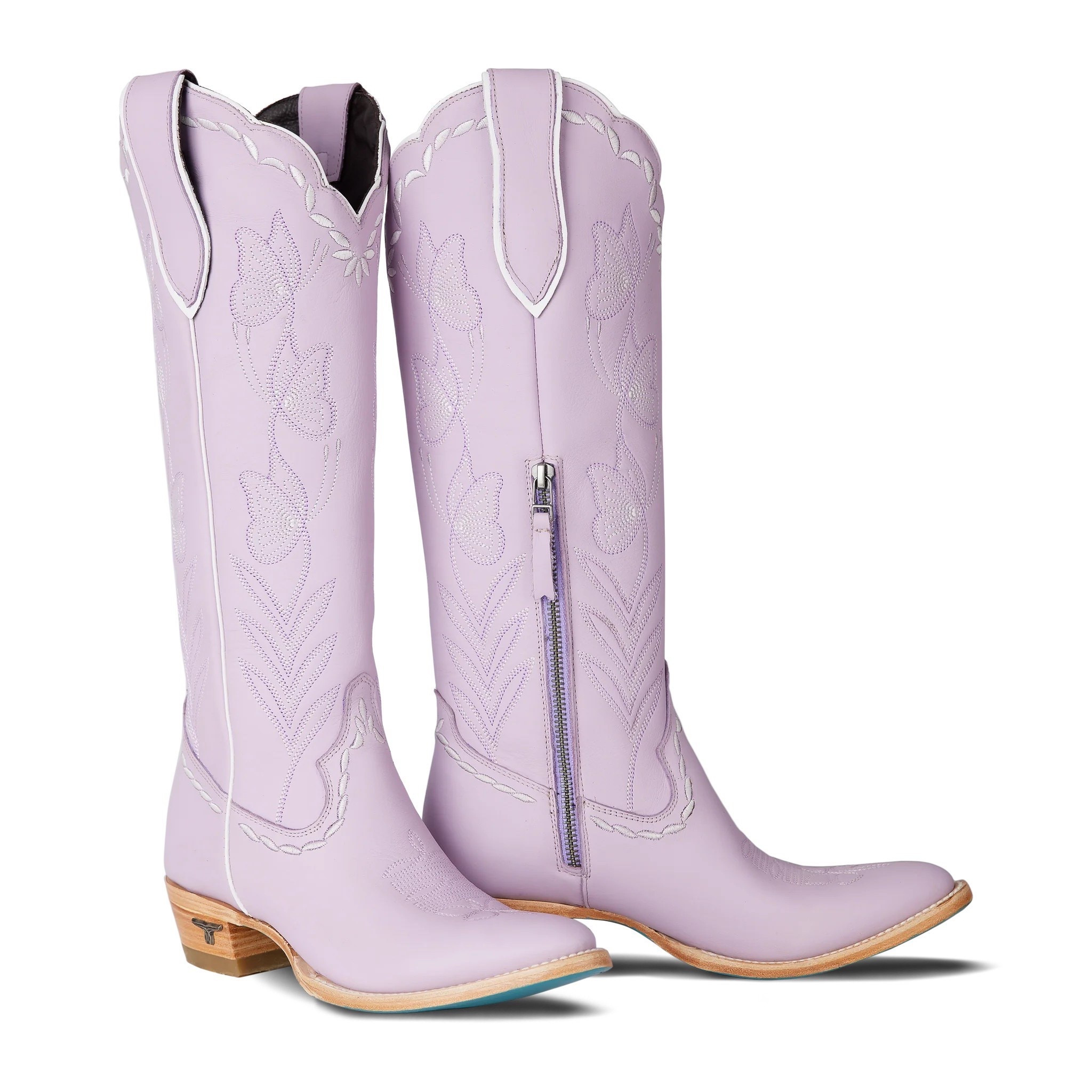 Looking for  statement boots? These lavender knee-high boots are perfect for adding a unique, stylish touch to dresses or spring outfits. Under $400.

Keywords: Cowboy boots, leather boots, country music concert, country concert, spring concert, summer concert, cowgirl boots, riding boots, western boots 

#LTKFestival #LTKTravel #LTKgrwm