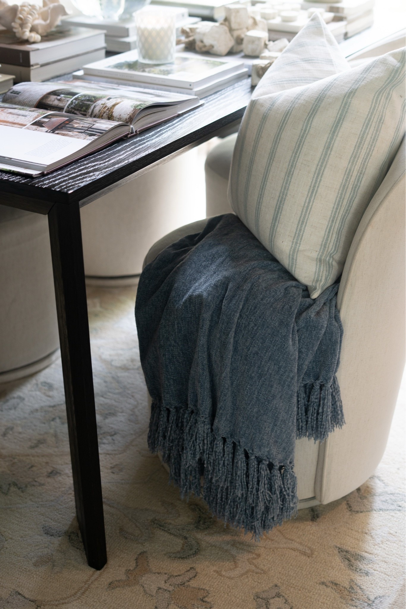 Okay THIS find! The softest throw, the prettiest fringe detail, and that perfect muted blue tone to pair perfectly with these stunning striped pillows… instantly made this space feel so much more cozy, elevated, and layered. It’s giving effortless, designer home vibes.

#LTKSeasonal #LTKHome #LTKOver40
