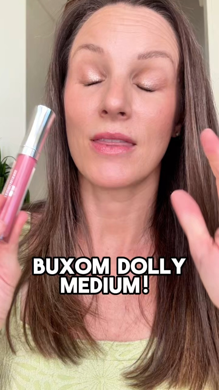 Dolly Medium is the perfect roseberry mauve with subtle shimmer. Cooling, glassy, and plumping without the sting. Hyaluronic acid + peptides make it feel like skincare for the lips. #buxomcosmetics #buxomdolly #plumpinggloss #beautyover40 

#LTKOver40 #LTKBeauty