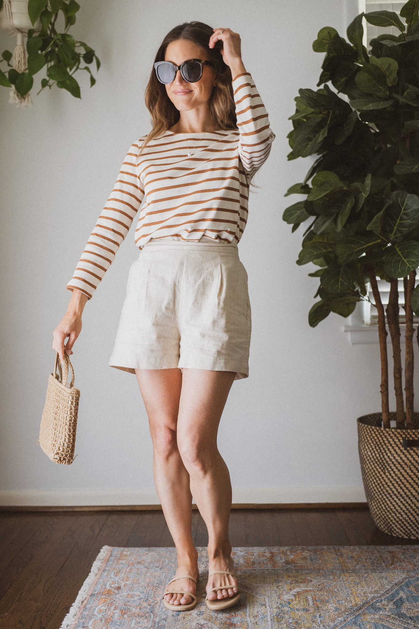 Daily Look 5.9

Sézane Mariniére fits TTS. Madewell linen blend shorts, I sized down. Tkees sandals fit TTS. Madewell straw bag. Nordstrom BP sunglasses. 

capsule wardrobe, casual chic

#LTKfit #LTKSeasonal