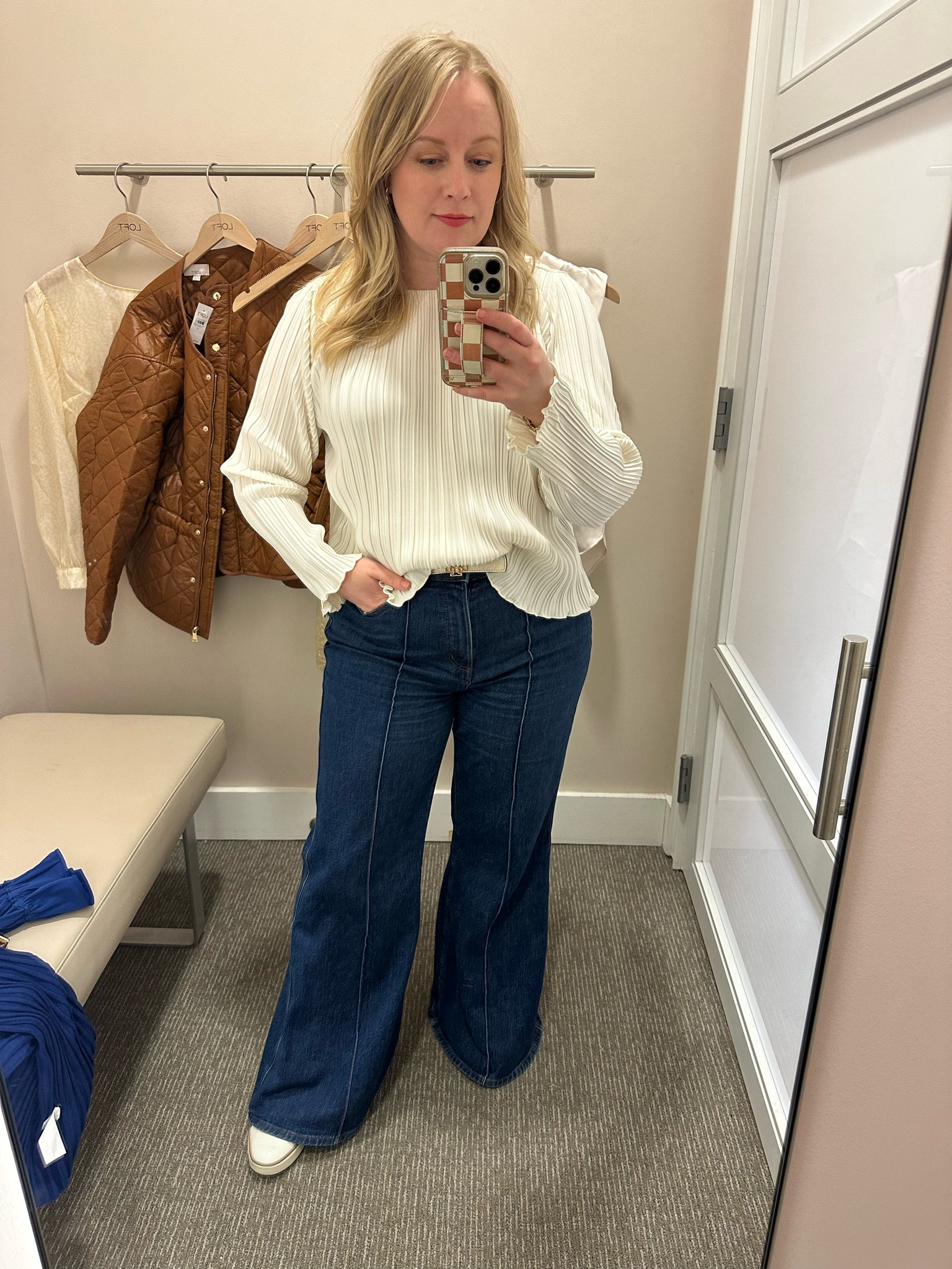 This cream pleated top is beautiful. Wearing a medium petite to keep the sleeves from being too long. Jeans are long. Consider ordering a petite if you are under 5’3”  