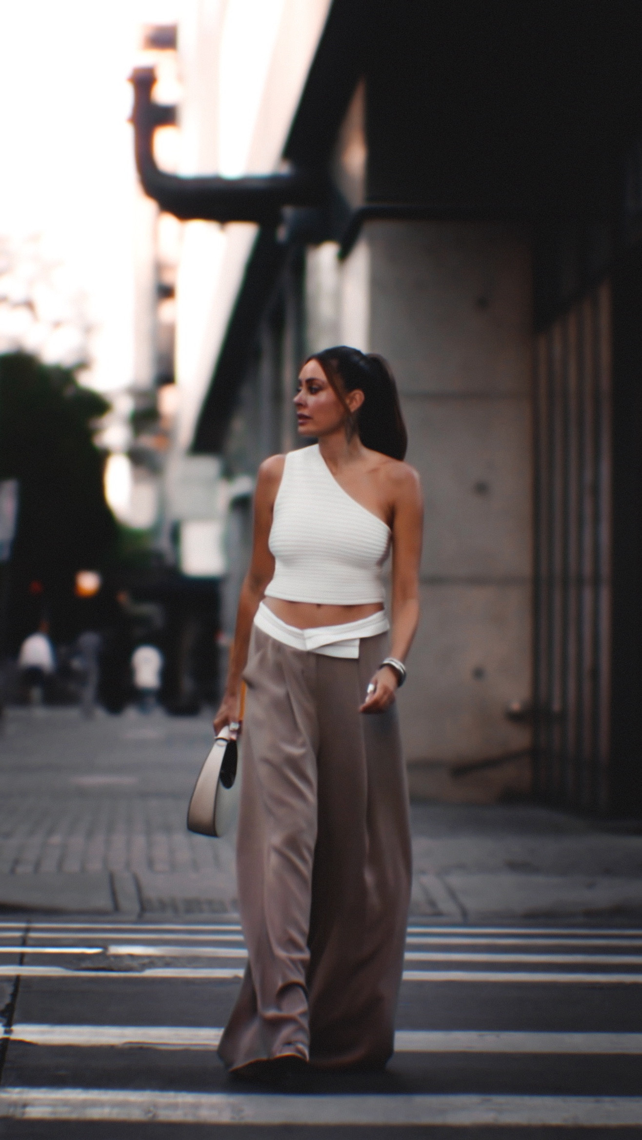 Asymmetry meets ease. A fitted knit shapes the look while flowy trousers move with the rhythm of Austin’s streets.  

LOVE pieces that have a unique twist including this one shoulder knit with unique back details. Make a statement while walking away.  Linked similar trousers.  Top first tts wearing size xs  

#LTKItBag #LTKStyleTip #LTKParties