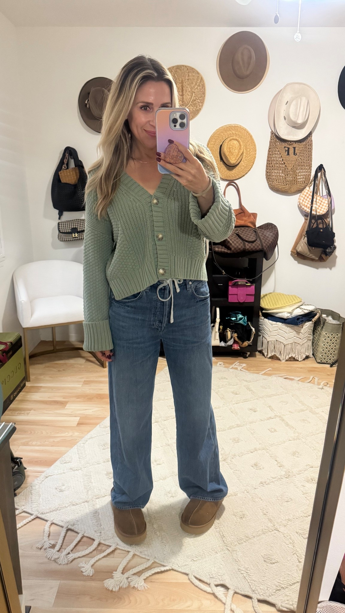 Rainy day outfit ☔️ Still obsessed with these jeans and this sweater is so comfy and cute. My Ugg dupes are under $50 too ! 

#LTKootd #LTKSeasonal #LTKOver40