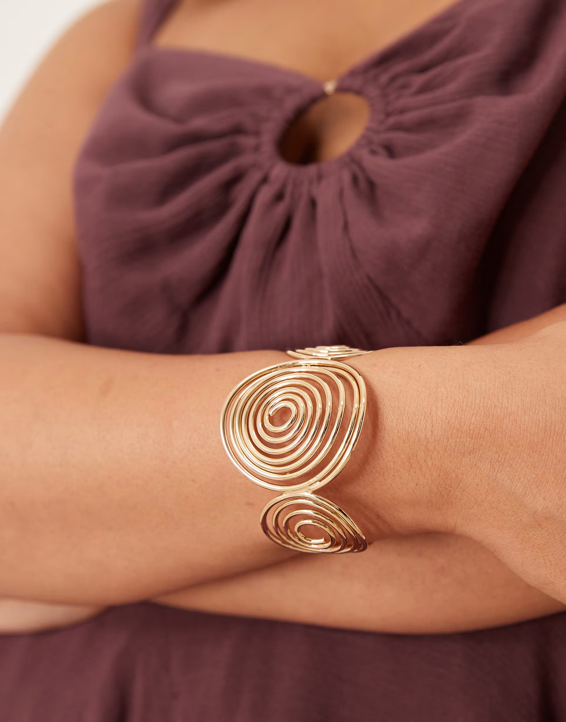 ASOS DESIGN Curve cuff bracelet with large spiral design in gold tone | ASOS | ASOS (Global)
