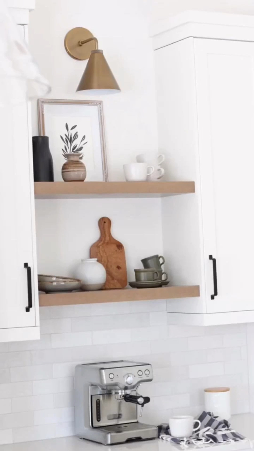 Loving the tumbled brass sconce we installed above the open shelves in our kitchen. It looks fantastic any time of the day! Where would you install it?

#LTKStyleTip #LTKHome #LTKSaleAlert