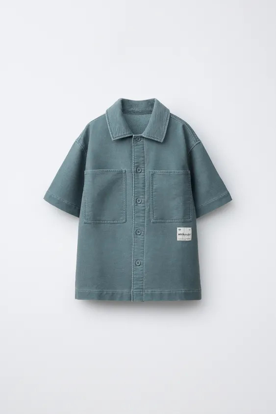Shirt with a shirt collar and short sleeves. Front button closure. Patch pockets on the chest. La... | Zara US