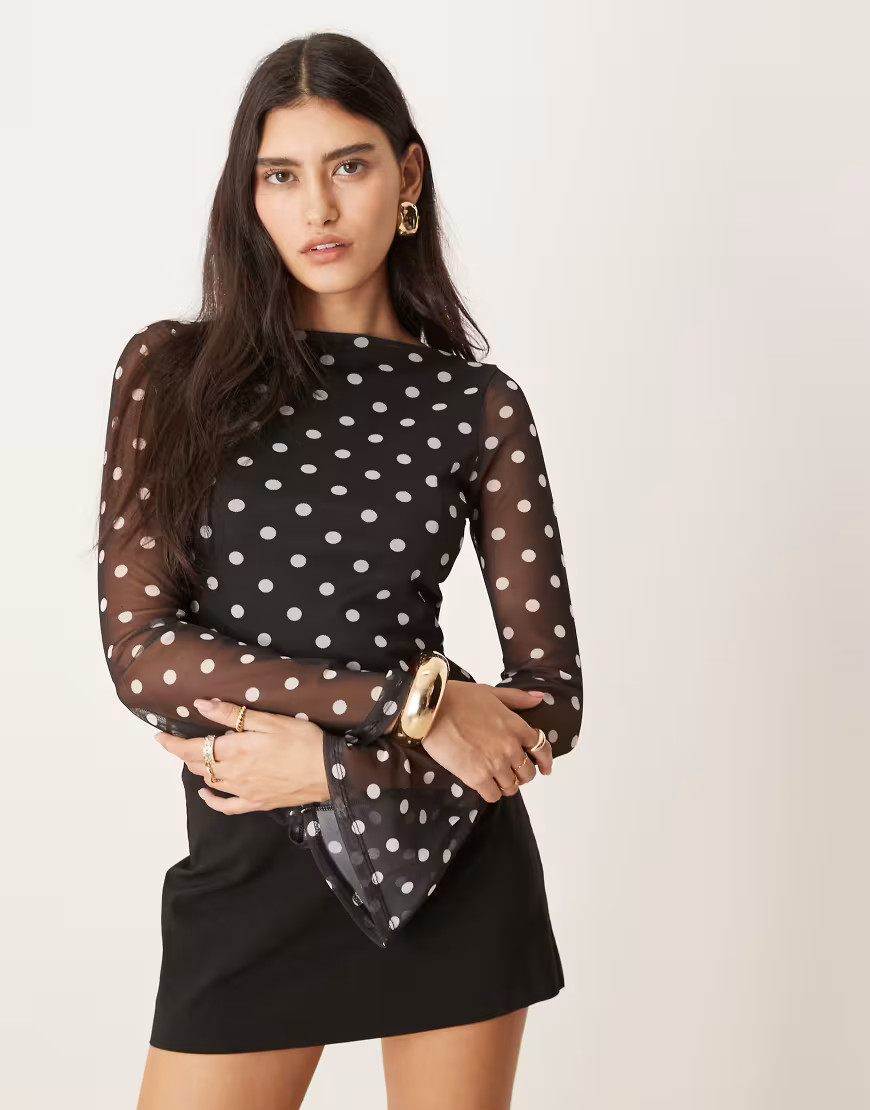 ASOS DESIGN polka dot printed mesh angel sleeve top with open tie back in black | ASOS (Global)