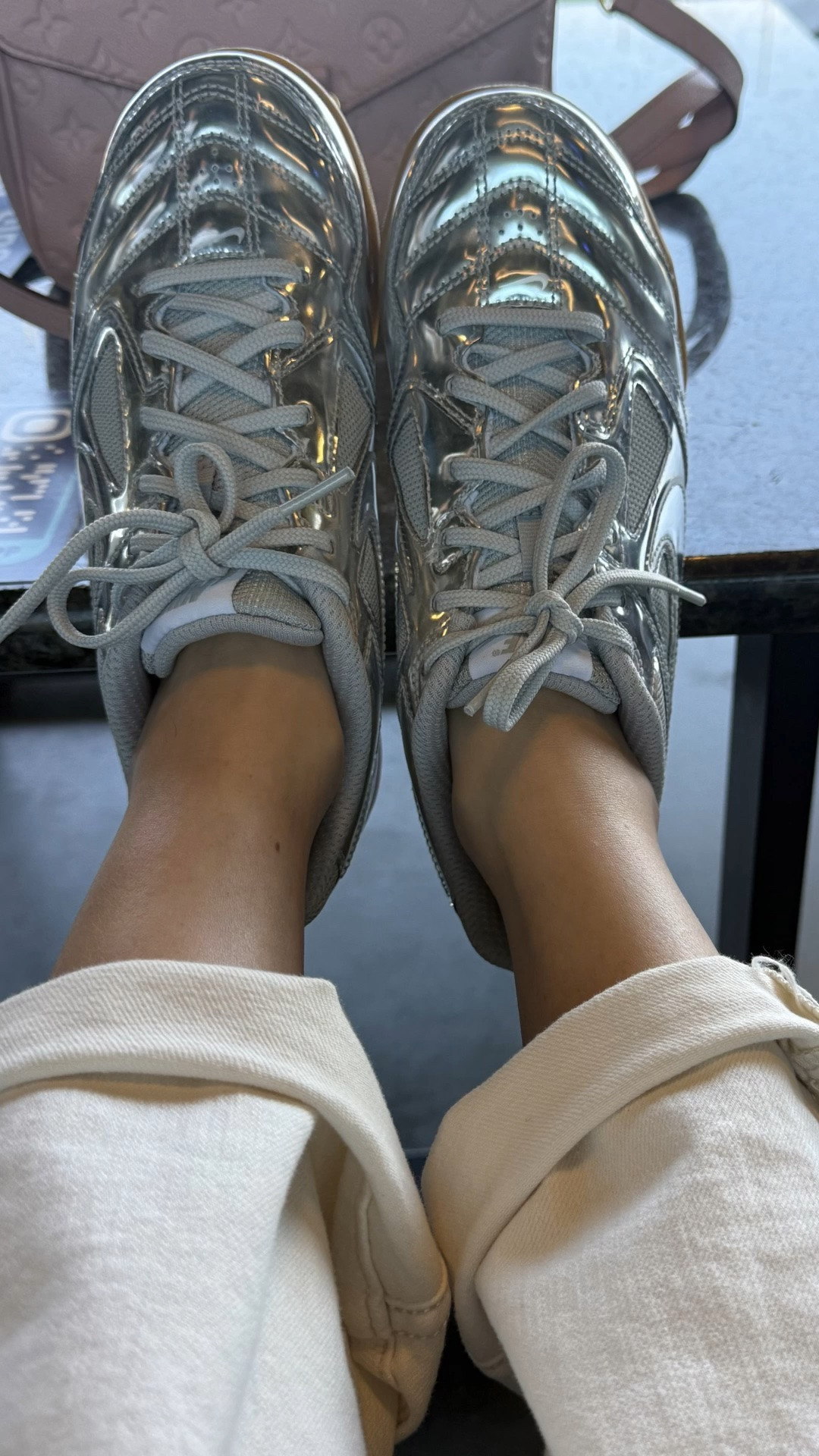 What to wear to Topgolf! ⛳️🤍 Had the absolute best weekend with my husband and our best friends trying Topgolf for the first time. If you want to look put-together but still be comfortable enough to play, a crisp white button-down, stretchy tailored pants, and a statement sneaker is the ultimate sporty-chic formula! These metallic silver Nikes (via Kicks Crew) completely elevated the whole outfit. Shop my exact weekend leisure look right here! #topgolfoutfit #sportychic #weekendstyle #nikewomen #kickscrew #casualstyle #sneakerstyle #weekendoutfit
@kickscrew

#LTKActive