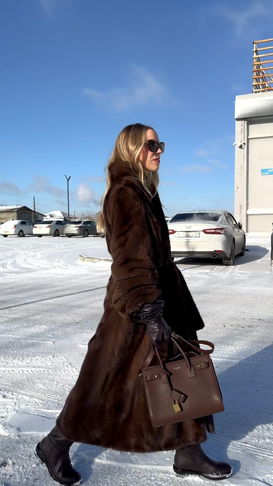 Brown fur coat, long fur coat, chocolate brown monochrome outfit, long brown leather gloves, brown lug sole riding boots, mink coat, Christmas market, Christmas shopping 

#LTKOver40 #LTKHoliday #LTKdayinmylife