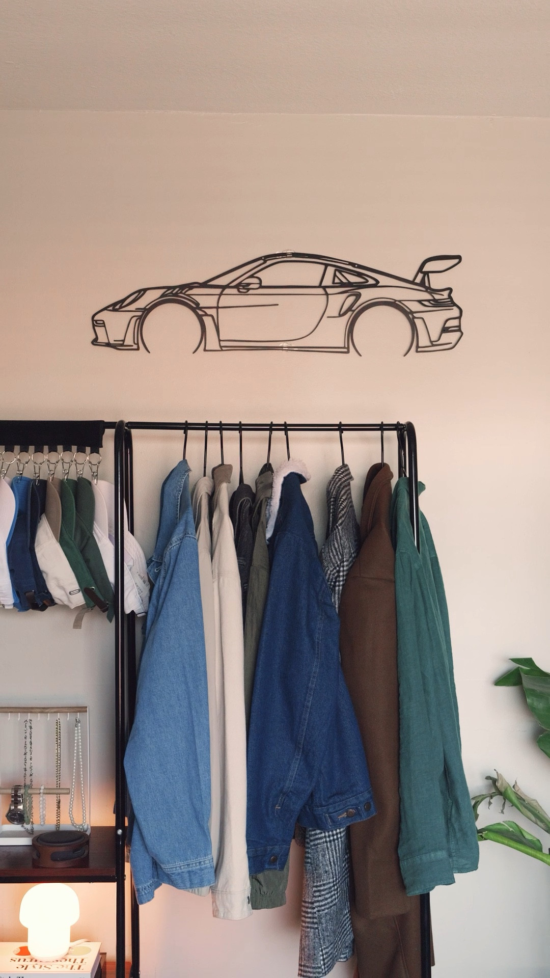 I recently got this Porsche 911 metal wall art for my studio and I think it was the final piece to complete the room.

I got the 35” x 9.5” size and it fits perfectly above my clothing rack. It was wayyy lighter than I thought it was going to be so just some clear command hooks to hang it did the trick.👍🏼

#home #decor #apartmentdecor #homedecor

#LTKSpringSale #LTKmens #LTKhome